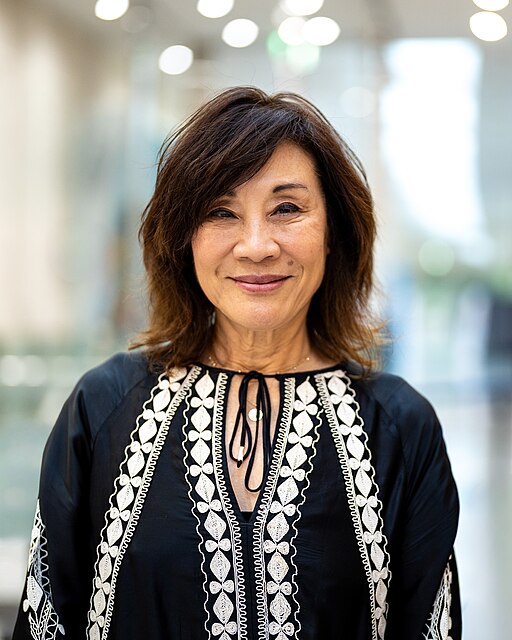 Janet Yang speaking at industry event