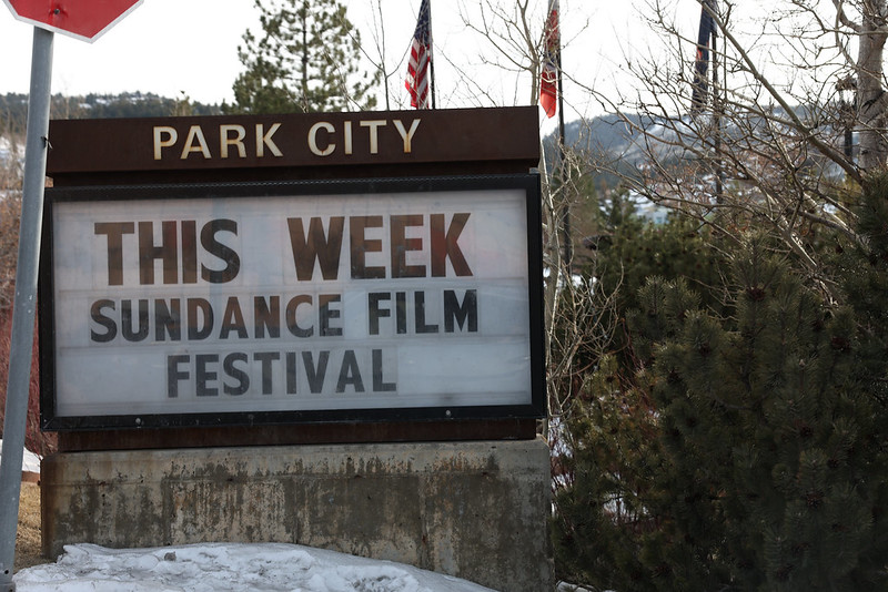 Outdoor venue at Sundance Film Festival 2026 with signage and attendees
