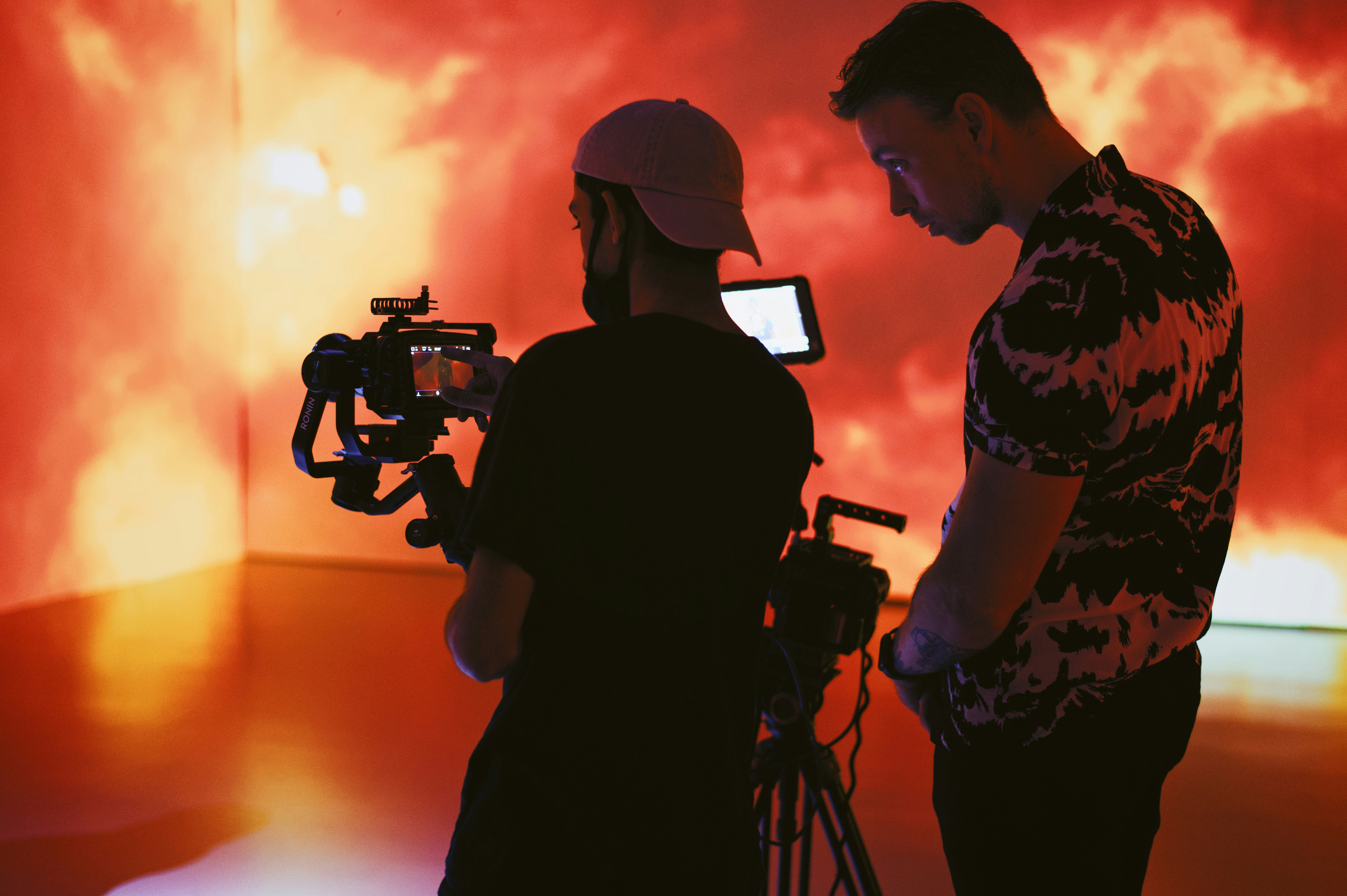 Director with professional camera equipment during production