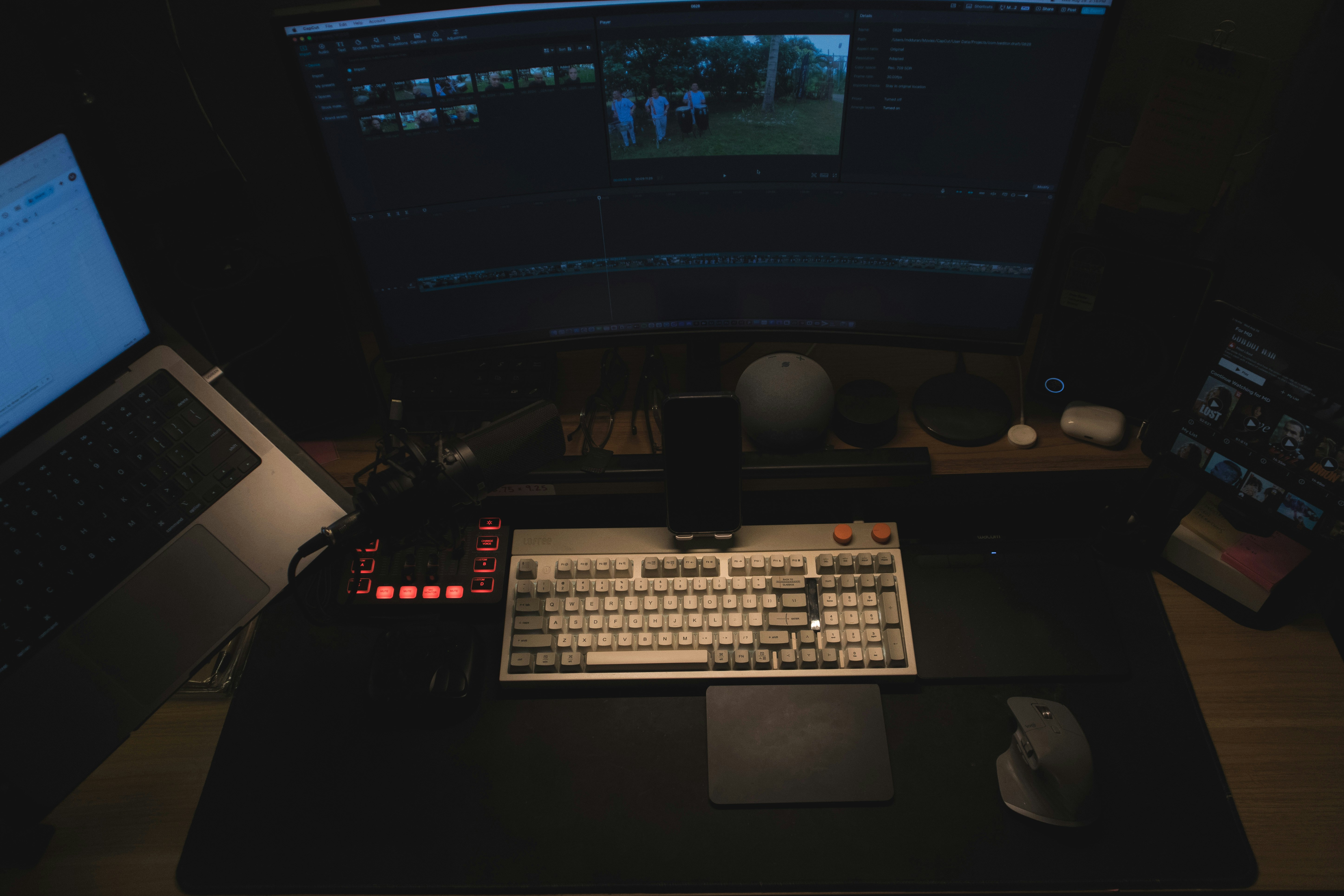 Professional video editing setup with dual monitors showing timeline and effects